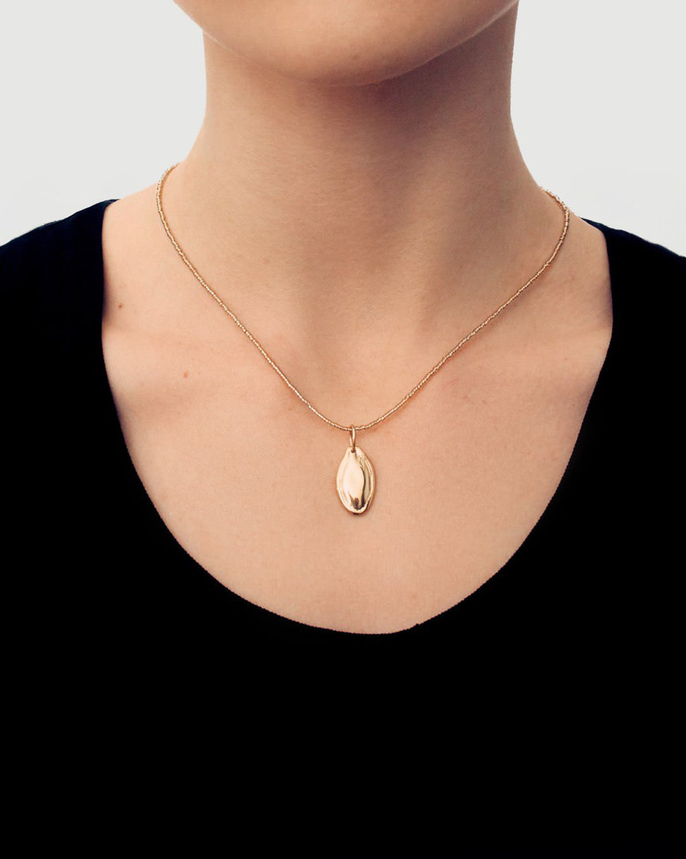 GOLD PLATED SILVER PUMPKIN SEED NECKLACE