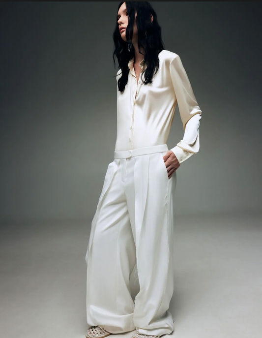 WHITE TROUSERS WITH RAW SEAM