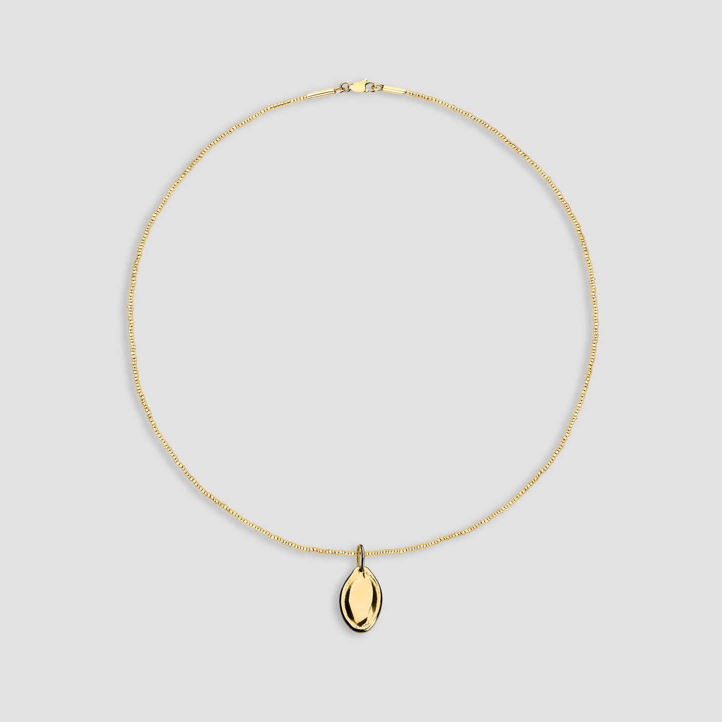 GOLD PLATED SILVER PUMPKIN SEED NECKLACE